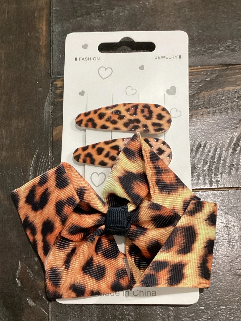 Fashion Jewelry Leopard Print Bow and Snap Clips - Orange & Black